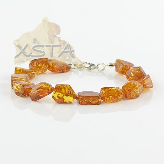 Amber bracelet cognac color with silver